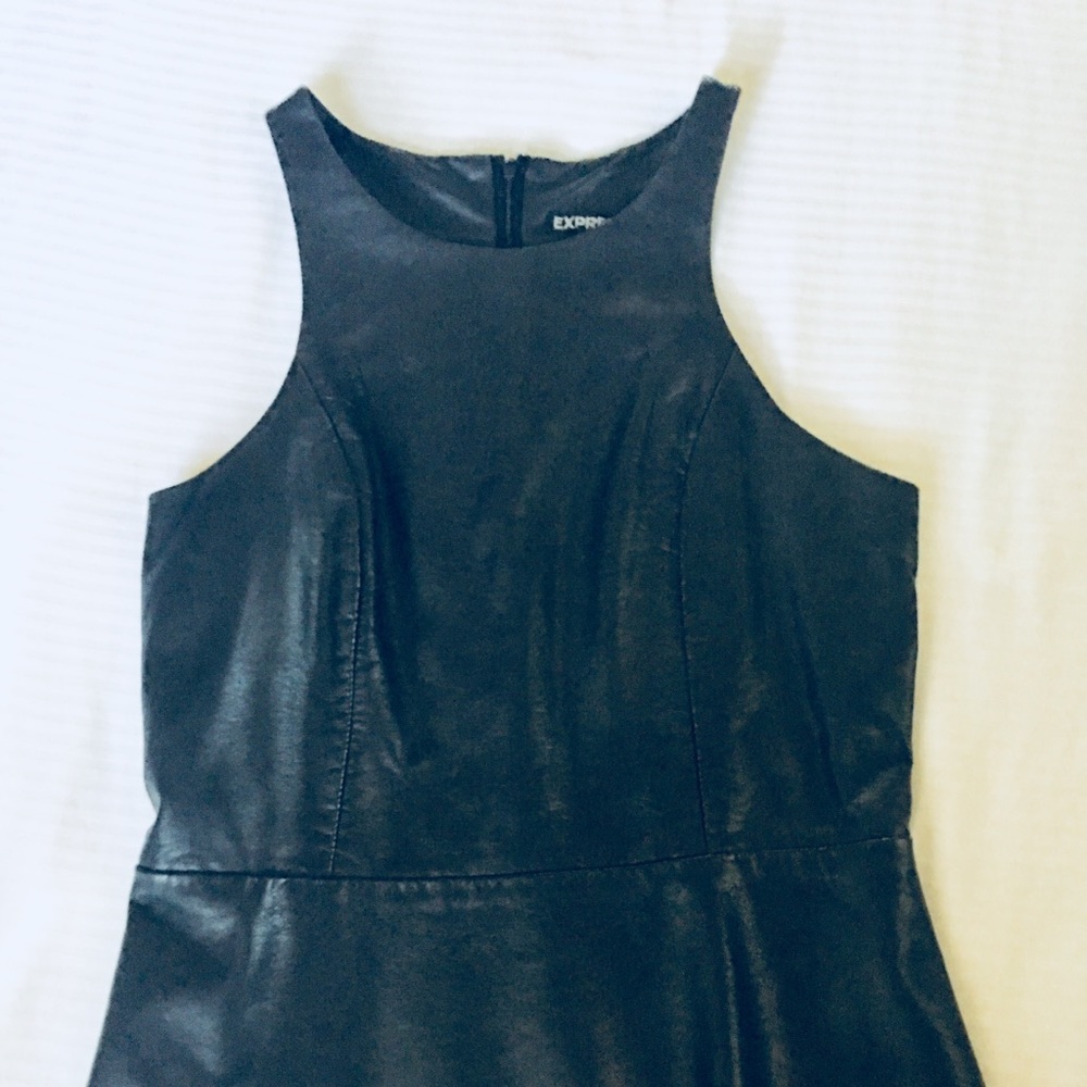 Express faux sleeveless black top.